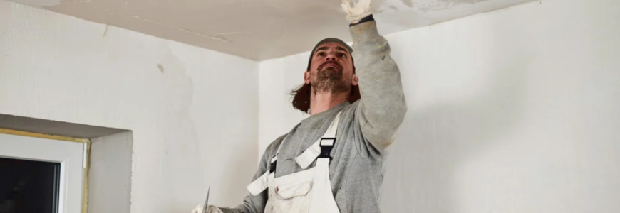 Ceiling installer working on a residential ceiling
